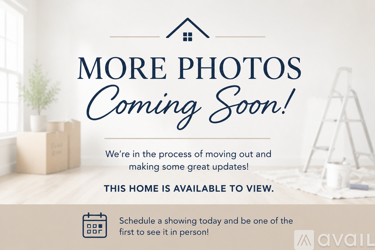 A sign announces that more photos are coming soon for a home that is available to view.