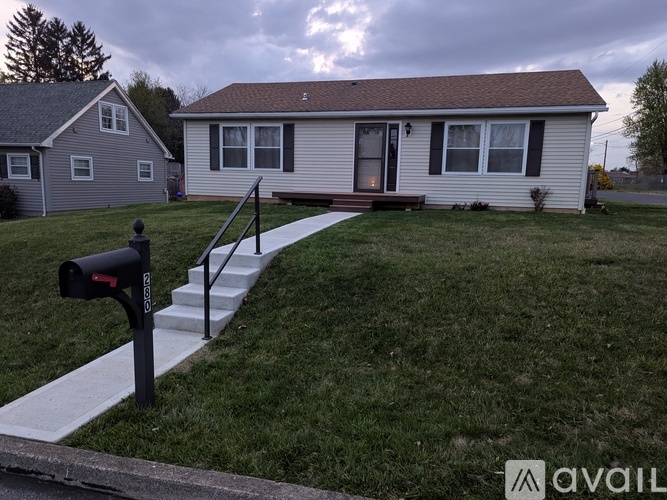 A house with a mailbox in front of it.