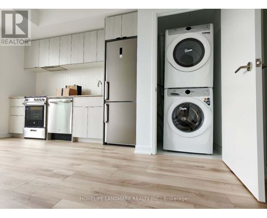 A laundry room with a washer and dryer in it.