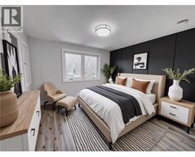 A bedroom with a large bed, a chair, and a nightstand.