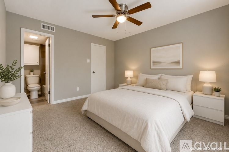 A bedroom with a white bed, a ceiling fan, and a small plant on a nightstand.