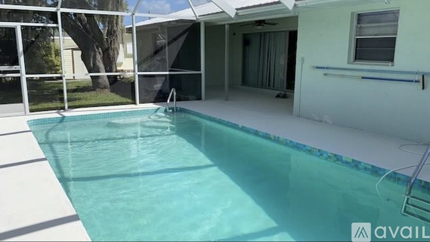 A small pool in a backyard.