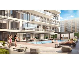A group of people are enjoying the outdoor pool area of a Royal LePage Signature Realty Brokerage.