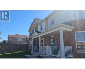 A house with a realtor logo in the corner.
