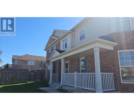 A house with a realtor logo in the corner.