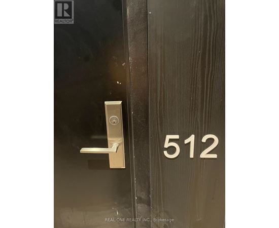 A door with a handle and a number 512 on the side.