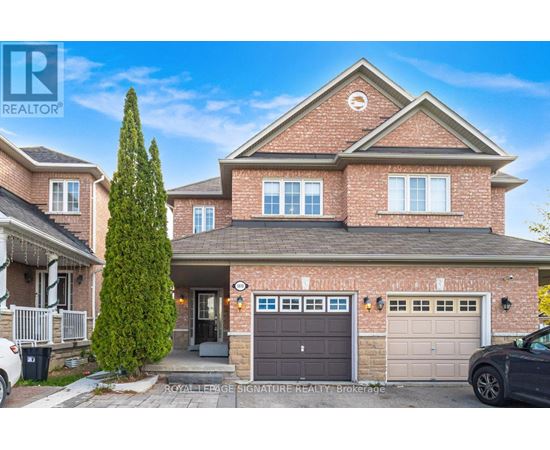 A house with a Royal LePage Signature Realty logo on the front.