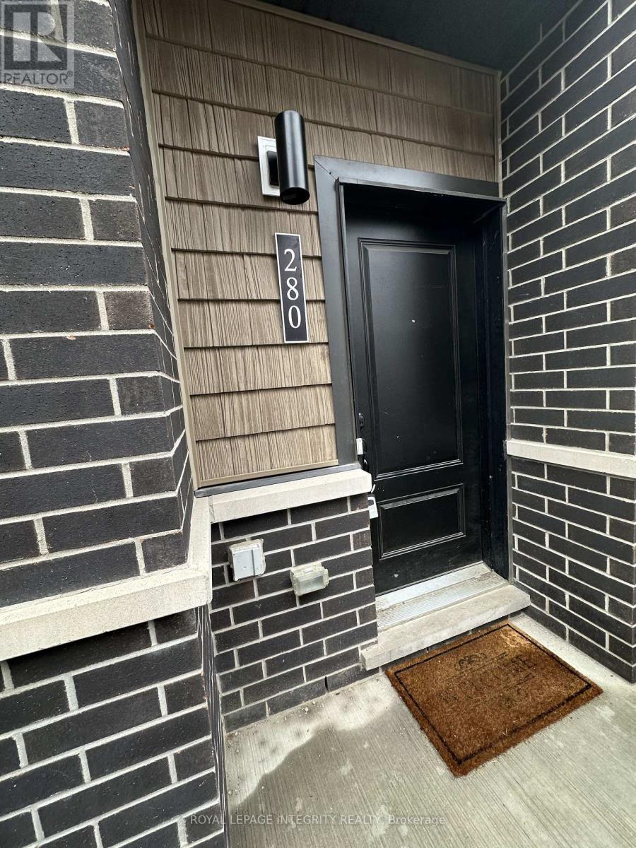 A black door with a number 2801 on the wall above it.