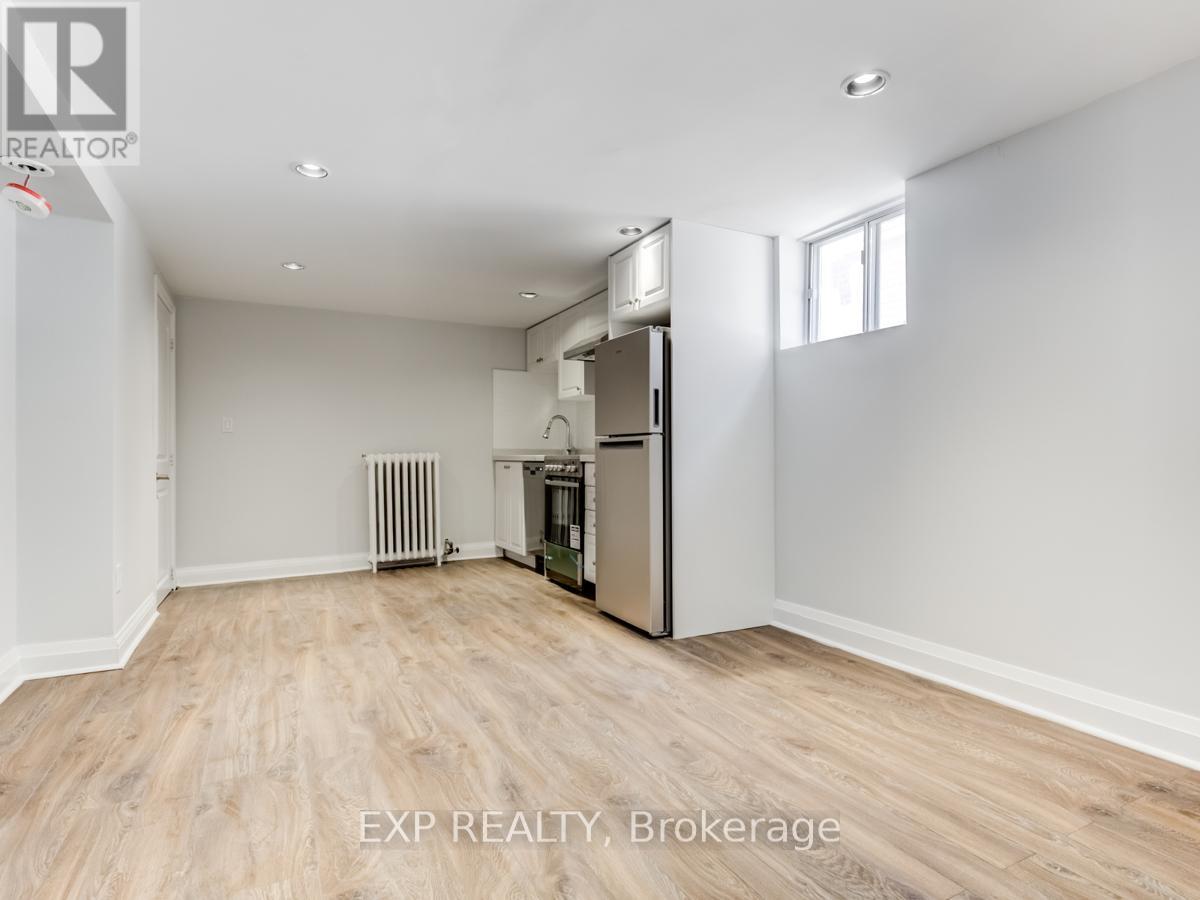 A spacious room with EXP REALTY, Brokerage watermark.