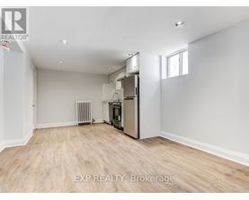 A spacious room with EXP REALTY, Brokerage watermark.