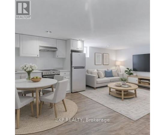 A modern kitchen with white appliances and a dining table set for four.
