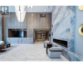 A modern living room with a fireplace and a large marble floor.