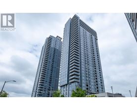 Two tall buildings with windows are seen in the image.