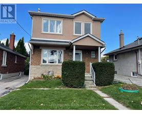 A house with a brown roof and a white window is for sale.