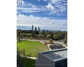 A real estate company's brokerage office overlooks a city skyline.