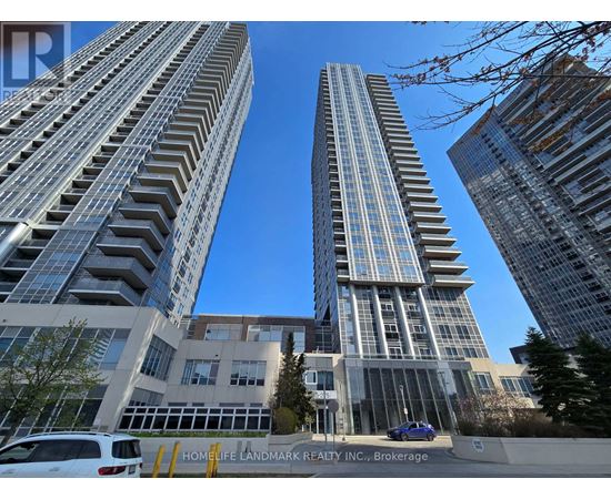 Two tall buildings stand next to each other with a Home Life Landmark Realty Inc. sign in the foreground.