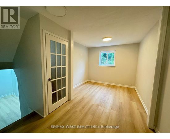 A room with a door and a window.