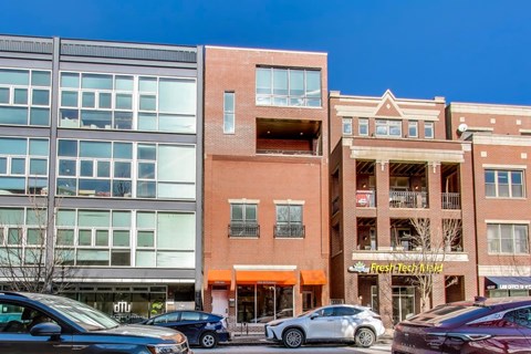 A building with a sign that says "Rest Tech" is in the background.