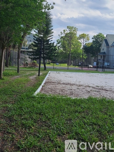 A grassy area with a white line in the middle and a sign that says "avail".