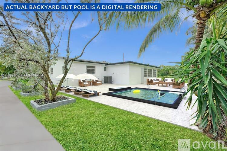 A backyard with a pool and a house.
