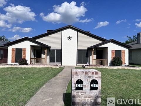 A house with a sign in front that says "available".