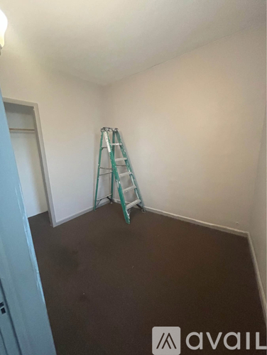 A room with a ladder in it.