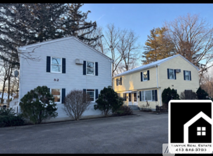 A real estate sign is superimposed on a photo of a house.