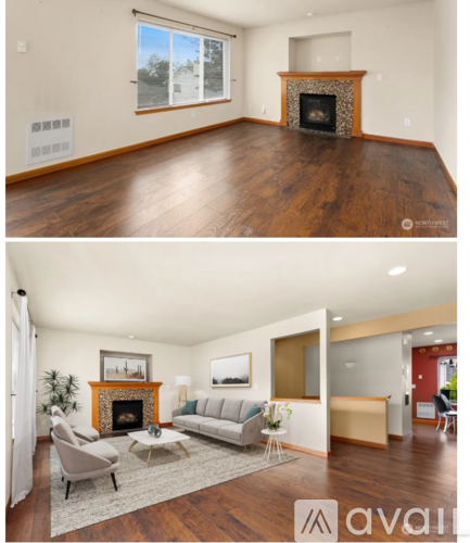 A living room with a fireplace and a couch.