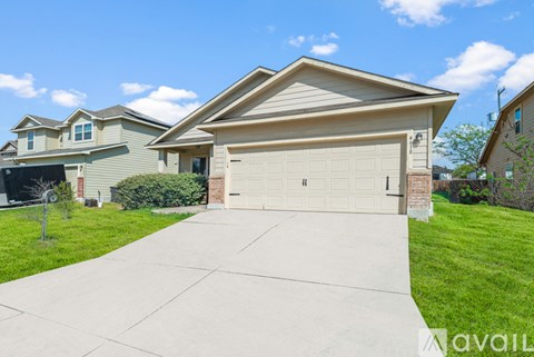 A house with a garage is available for sale.