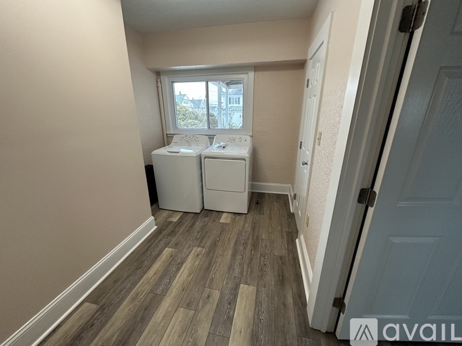 A laundry room with a washer and dryer.