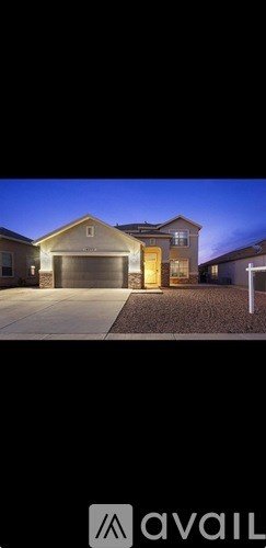 A house with a garage is shown in the image.