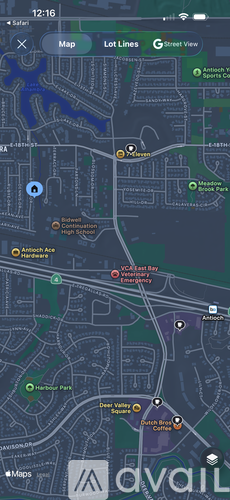 A map application is open on a device screen, showing a map with various location markers and options for map, lot lines, and street view.