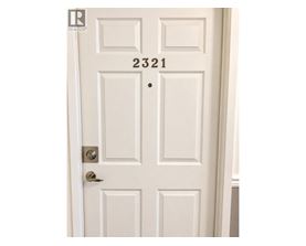A white door with the number 2321 on it.