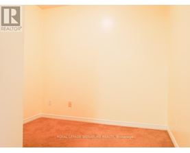 A room with a Royal LePage Signature Realty logo on the bottom left corner.
