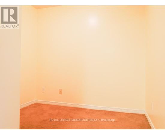 A room with a Royal LePage Signature Realty logo on the bottom left corner.