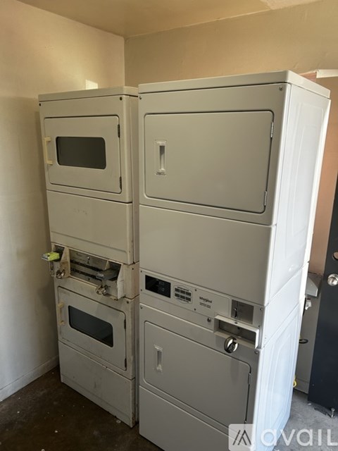A white oven and microwave combo unit is on display.