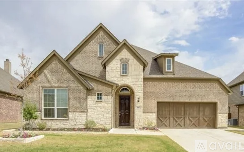 A house with a brown door and windows is for sale.