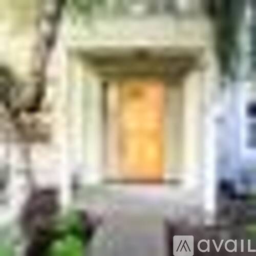 A blurry image of a building entrance.