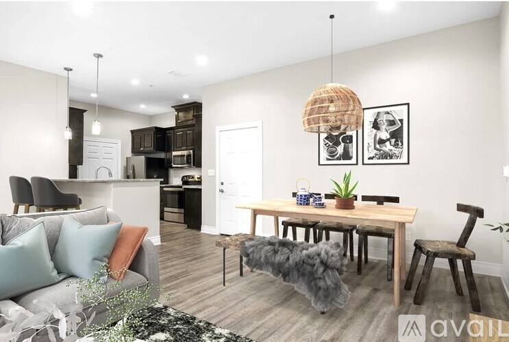 A dog is standing on a rug in a living room.