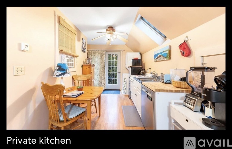 A private kitchen with a table and chairs.