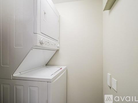 A white dishwasher is installed in a kitchen.
