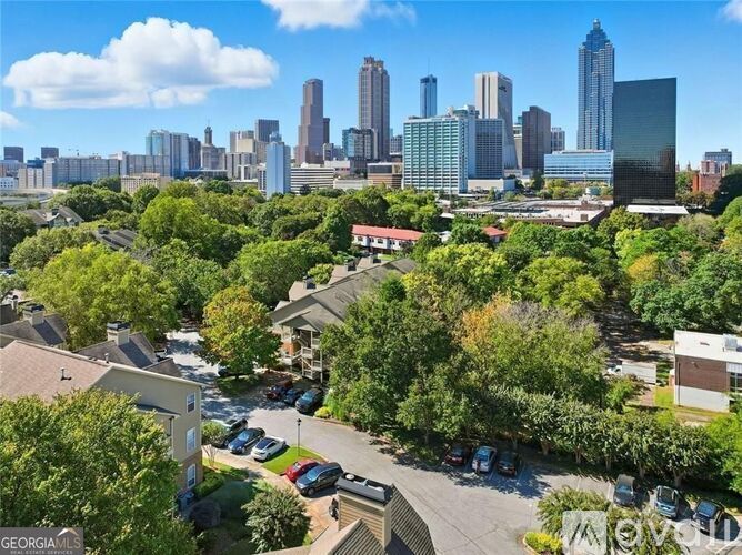 A cityscape with a mix of residential and commercial buildings.