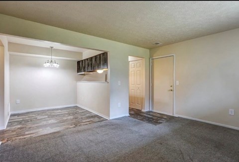 A room with a door and a window.