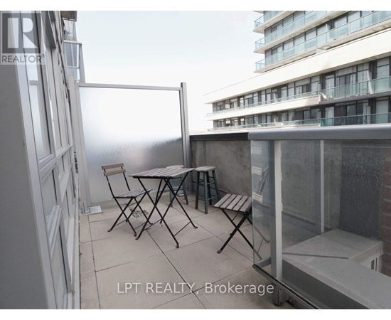 A balcony with a table and chairs is shown with the text "LPT REALTY, Brokerage".