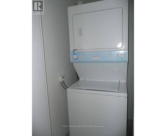 A white dishwasher with a blue control panel.