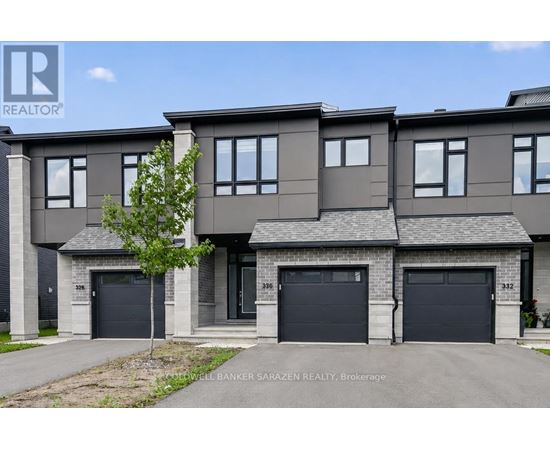 A modern two-story house with a garage is for sale.