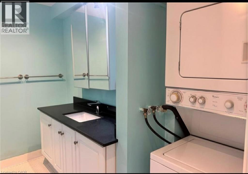 A laundry room with a washer and dryer.