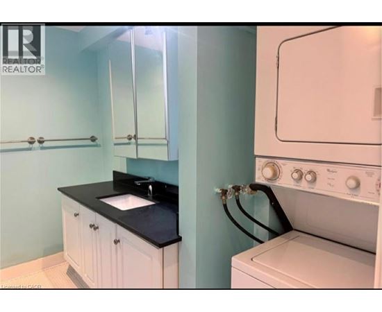 A laundry room with a washer and dryer.