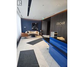 The lobby of the Oscar Residences is clean and well-organized.