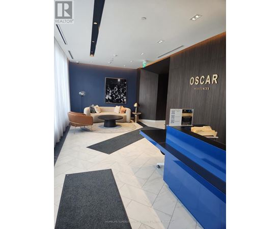 The lobby of the Oscar Residences is clean and well-organized.